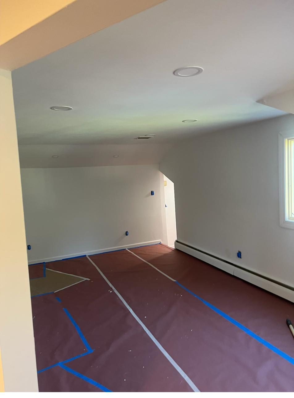 Room fully prepped and taped for interior painting